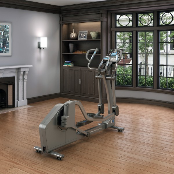 The Life Fitness E5 Elliptical Cross Trainer set up in a home setting