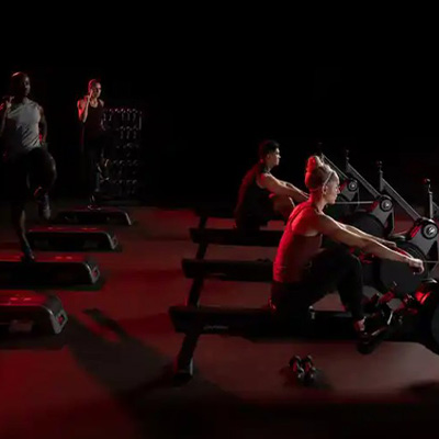 Group training session on Life Fitness Heat Performance Row units