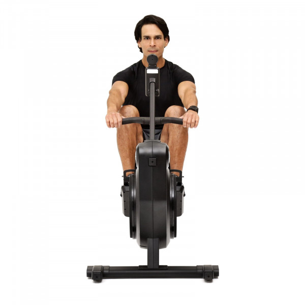 Front view of a user rowing on the Life Fitness Heat Performance Row