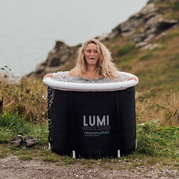 Lumi Recovery Pod Max Ice Bath Outdoor a women enjoying ice bath 