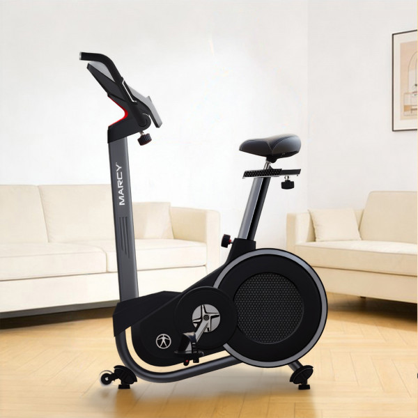 Marcy Pursuit Premium Home Upright Bike set up in a living room