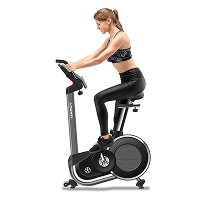 Model riding the Marcy Pursuit Premium Home Upright Bike during a workout