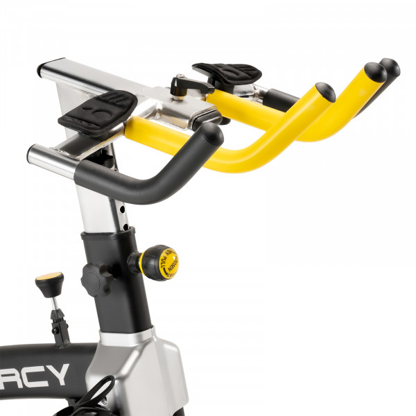 Close-up of the Marcy 7038 Studio Bike handlebars with padded forearm supports and adjustable positioning