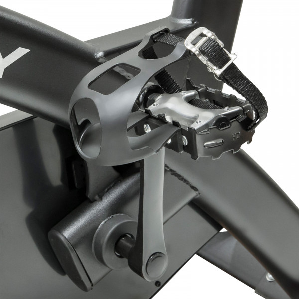 Pedal with adjustable toe cage and securing strap on the Marcy 7038 Studio Bike