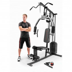 Image of the Marcy MKM-81030 Home Gym with a model stood beside it