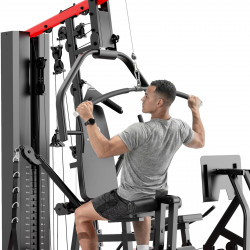 Marcy HG9000 Deluxe Leg Press Home Multi-Gym - model performing a lat pulldown 