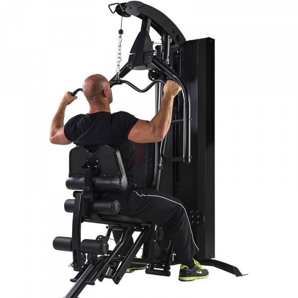 Individual during an exercise session on the Marcy HG7000 Home Gym.
