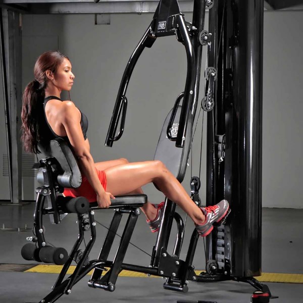 Individual actively engaging in a workout on the Marcy HG7000 Home Gym.