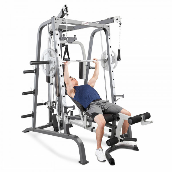 Image of the Marcy MD-9010G Smith Machine - Model performing Smith Bench Press