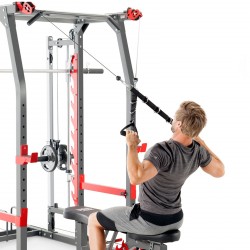 Person mid-workout using the Marcy Pro SM-4903 Smith Machine.
