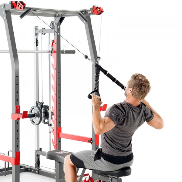 Person mid-workout using the Marcy Pro SM-4903 Smith Machine.