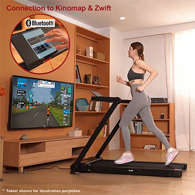 Model running on the Marcy Walk N Run Walking Pad Treadmill with Bluetooth app connectivity 