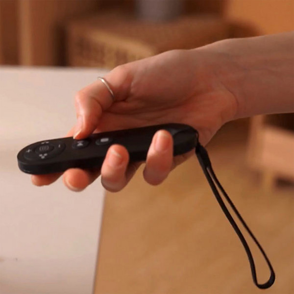 Close-up of the remote control for the Marcy Walk N Run Walking Pad Treadmill