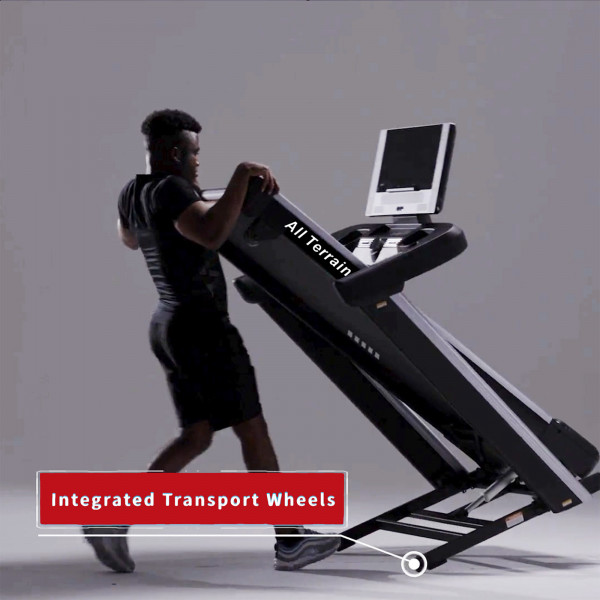 Model moving the Marcy All Terrain Power Fold Treadmill using transport wheels