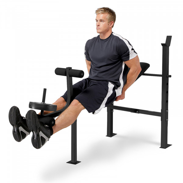 Marcy MWB-6501 Standard Weight Bench - lifestyle image of model performing leg extension..