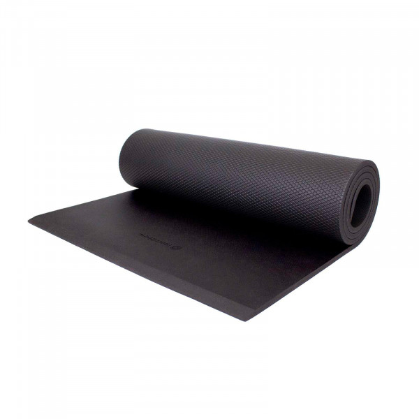 Angled view of the rolled black Merrithew Eco-Lux Imprint Mat