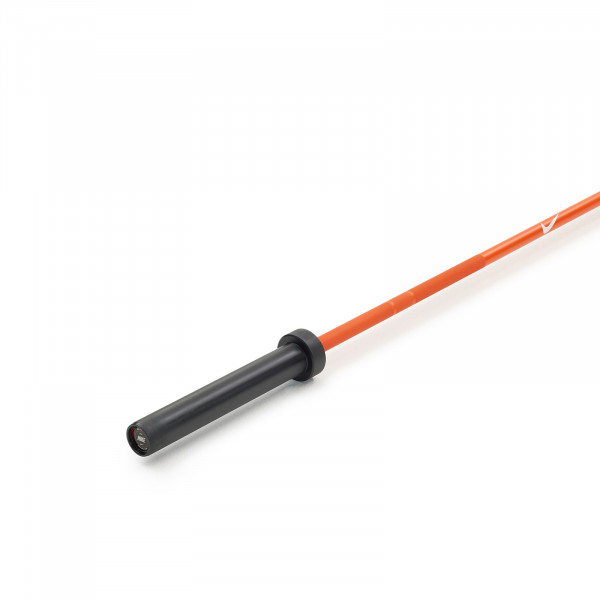 Close-up view of the Nike Strength Premium Barbell 15kg in orange.