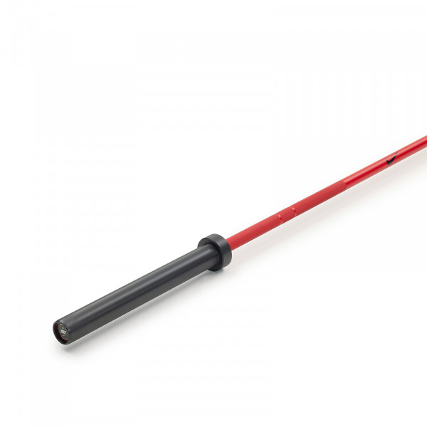 Close-up view of the Nike Strength Premium Barbell 20kg in red.