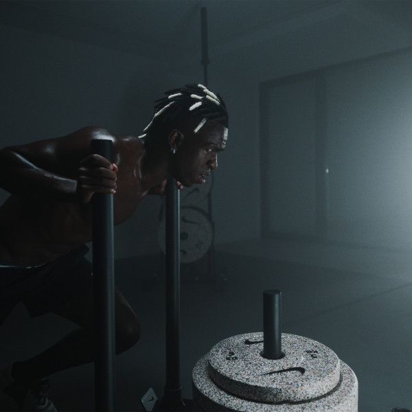Lifestyle image of Vinni Jr using the Nike Strength Sled