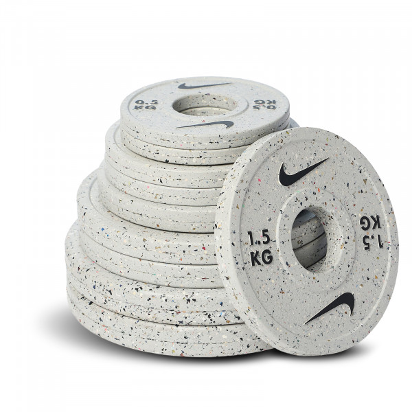 Hero image of the Nike Strength Grind Change Plates all stacked together.