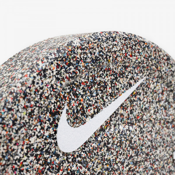 Close-up angled view of a Nike Strength Grind Bumper Plate.