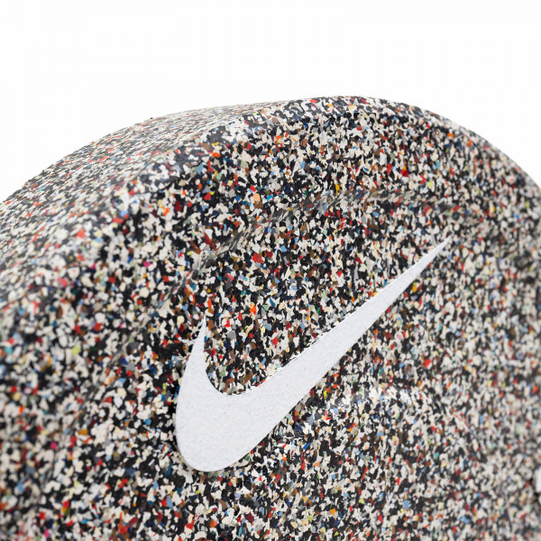 Close-up angled view of a Nike Strength Grind Bumper Plate.