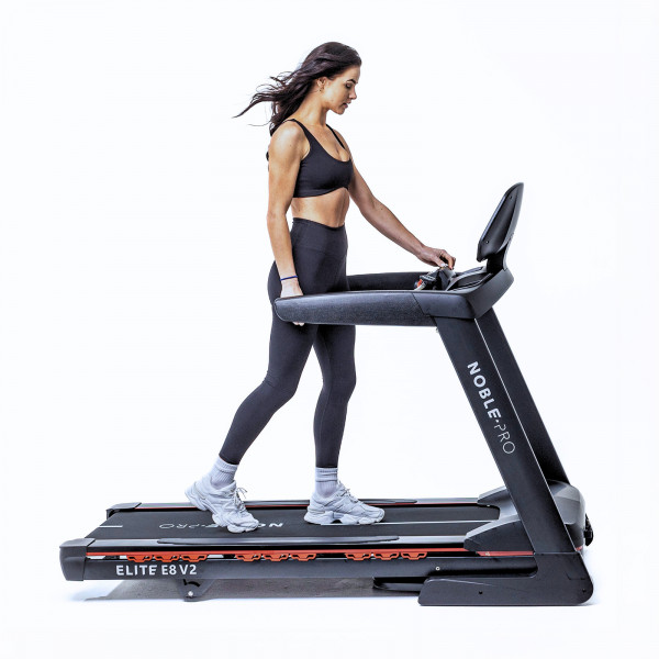 Model walking on the NoblePro Elite E8ix Treadmill