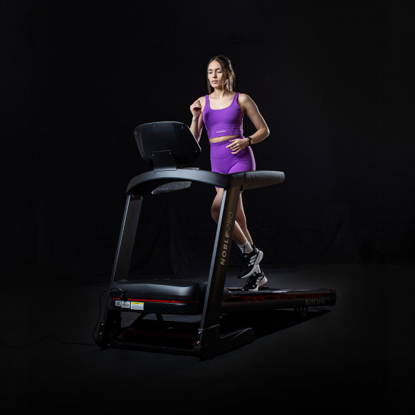 Model jogging on the NoblePro Elite E8s Treadmill