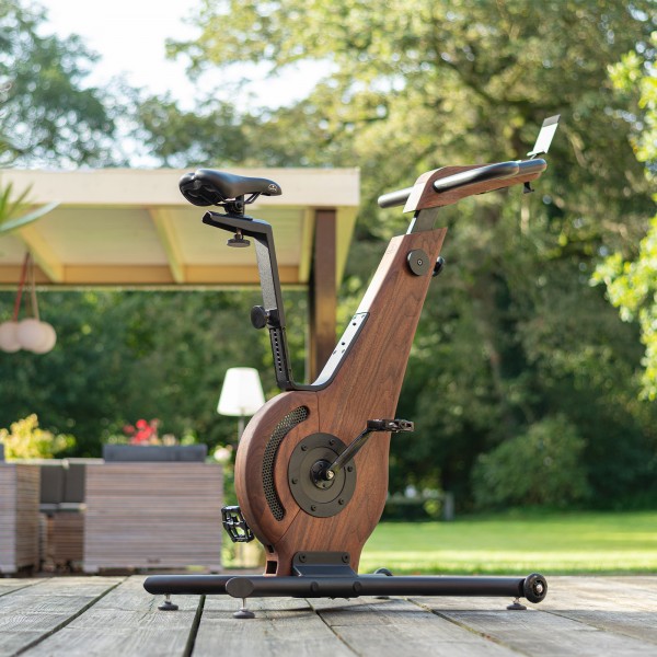 NOHRD Bike V2 in a garden gym setting.
