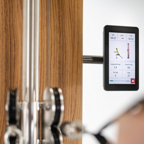 Product image of the NOHRD Slimbeam Monitor being used during a workout