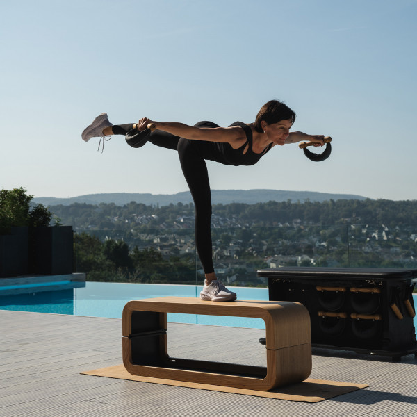 User balancing on NOHRD StepBox with SwingBells.