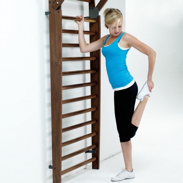 NOHRD WallBars 14 Bars - a woman doing stretching exercises