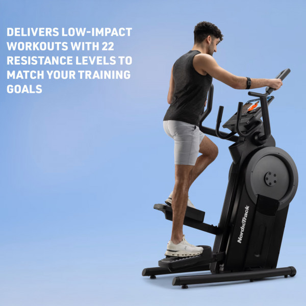 Side view of a person using the NordicTrack Step Climber XL