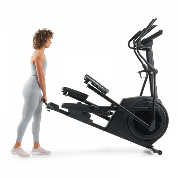 Model lifting and moving the NordicTrack AirGlide 14i Elliptical for storage