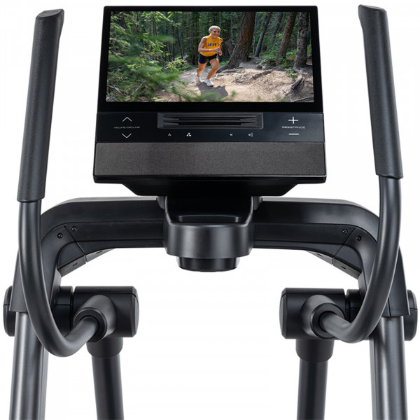NordicTrack X16 Elliptical console close-up with touchscreen displaying outdoor running workout