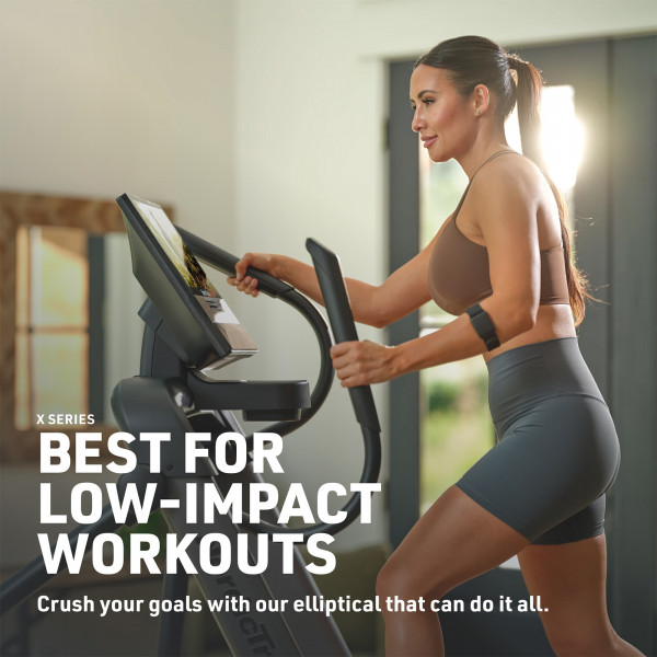 Model working out on NordicTrack X16 Elliptical with low-impact workout text on screen