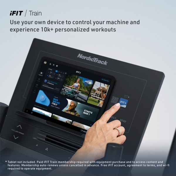 Close-up of the NordicTrack AirGlide LE Elliptical console showing iFIT Train workouts on a connected tablet
