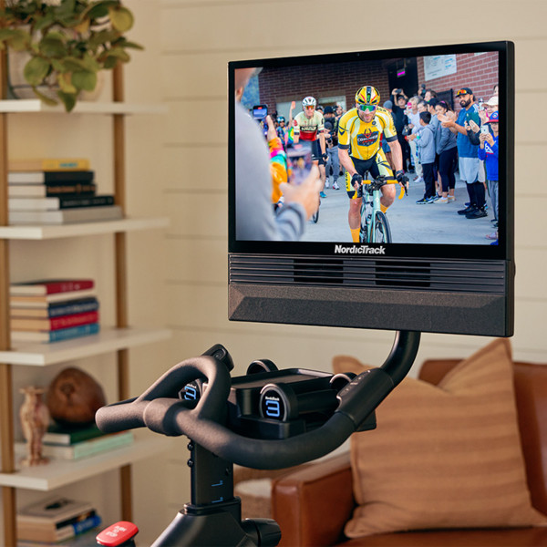 Closeup of the touchscreen on the NordicTrack X24 Bike showing live cycling workout