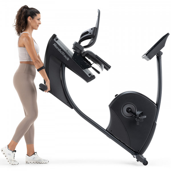 Person moving the NordicTrack 10 Recumbent Bike.