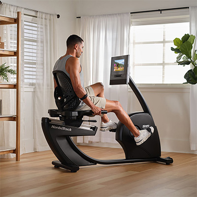 Person pedalling on NordicTrack 10 Recumbent Bike at home