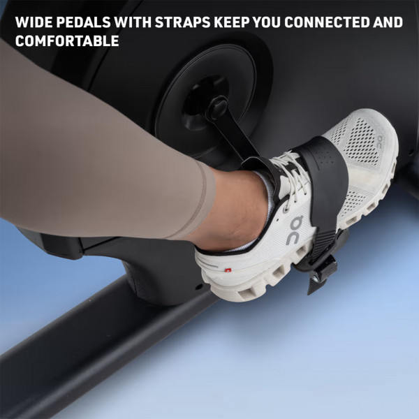 Person’s foot secured in pedal straps on NordicTrack 10 Recumbent Bike