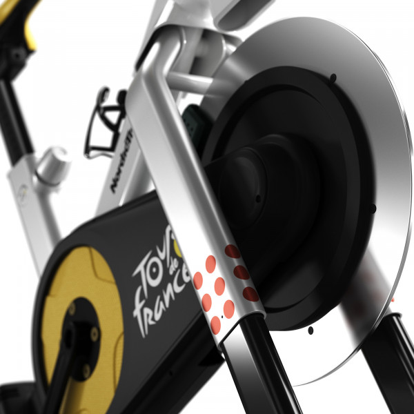 Close-up of the flywheel and frame details on the NordicTrack Tour de France Indoor Bike.