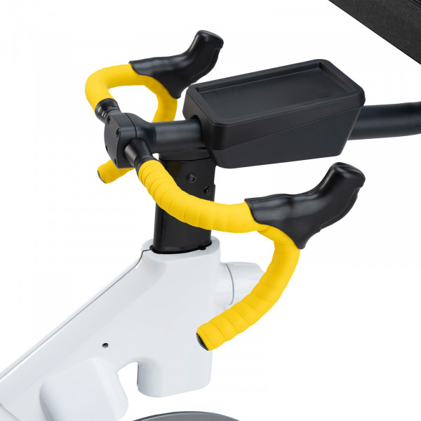 Close-up of the yellow drop handlebars on the NordicTrack Tour de France Indoor Bike.
