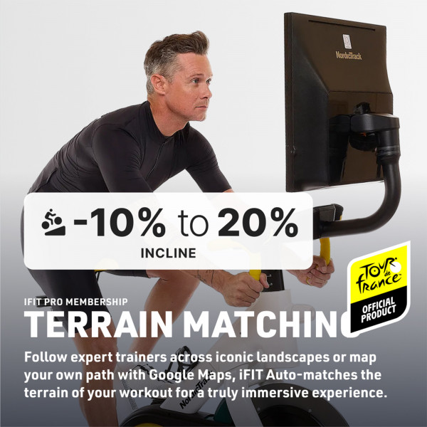 Model cycling on the NordicTrack Tour de France Indoor Bike with incline terrain matching feature overlay