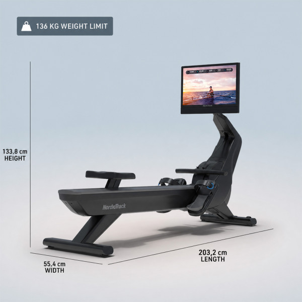 Side view of NordicTrack RW900 Rower with dimensions and weight capacity shown
