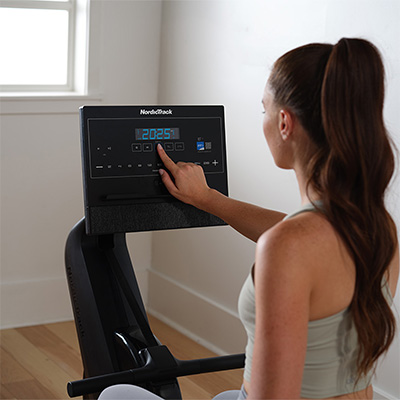 Model adjusting settings on the NordicTrack RW300 Rower console 