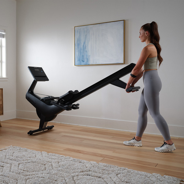 Model lifting and moving the NordicTrack RW300 Rower