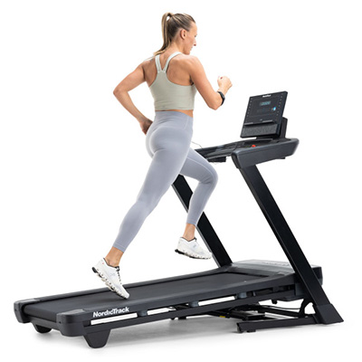 Model running on the NordicTrack T Series 7 Treadmill