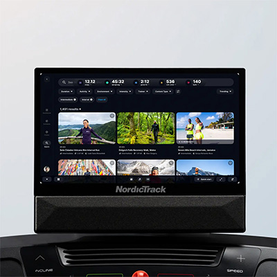 Close-up of the 16-inch HD touchscreen on the NordicTrack T Series 16 Treadmill displaying workout options