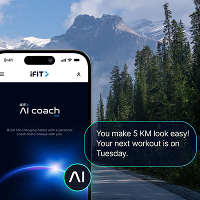 Close-up view of the iFIT AI Coach app on a smartphone with workout message overlay for the NordicTrack X16 Treadmill     